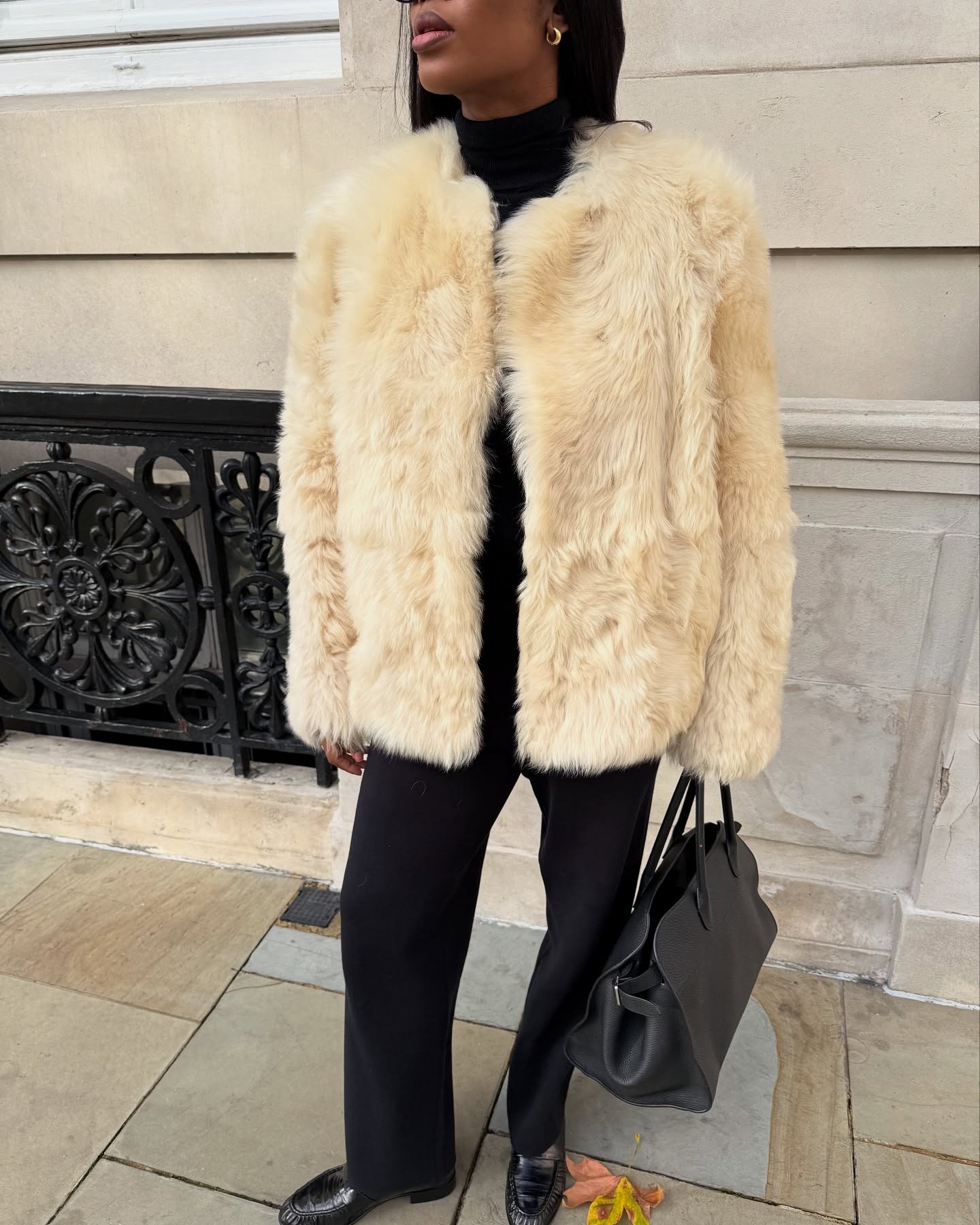 Marilyn NK wearing a fur coat