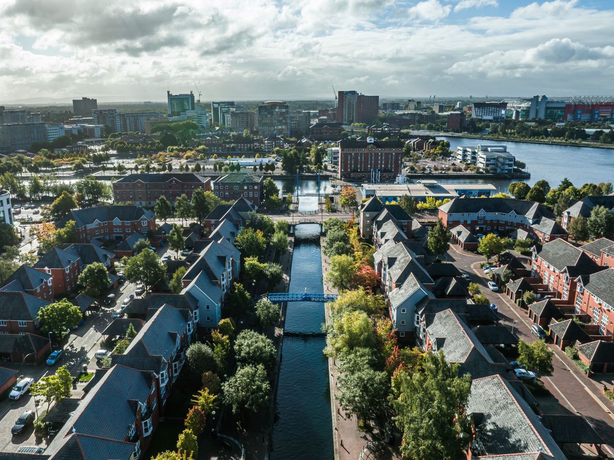 Overhead shot of a town next to a river