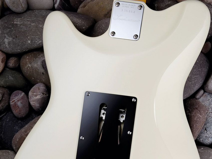 The rear of the body is contoured to aid upper fret access.
