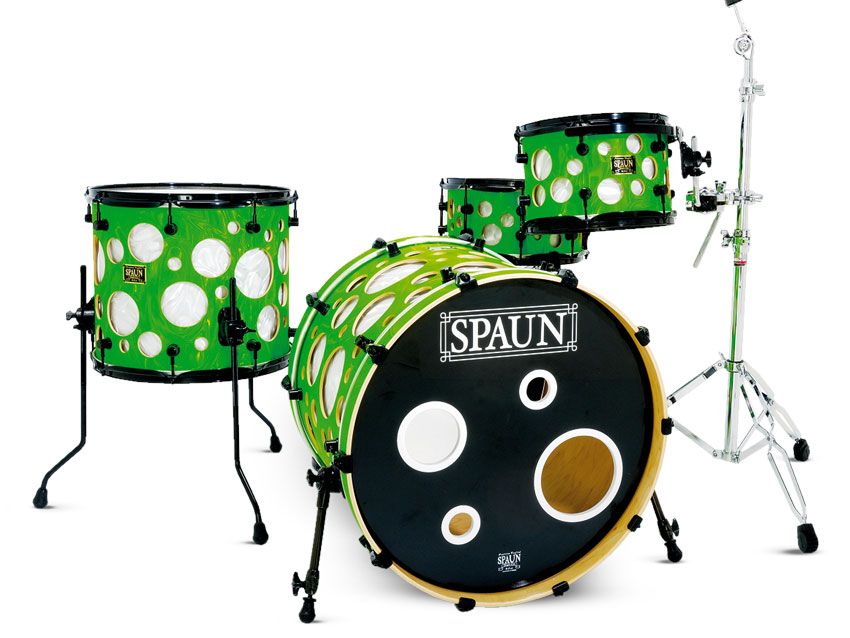 The multi-ports on the front bass drum head echo the holes in the drilled outer shells of the kit