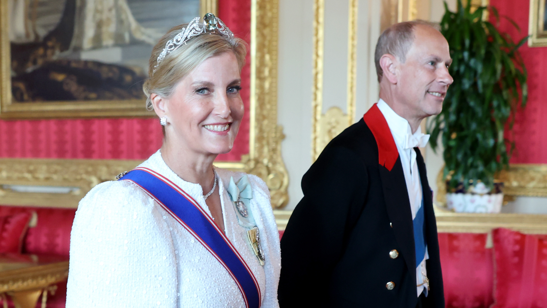 Duchess Sophie wearing a white dress and diamond tiara smiling