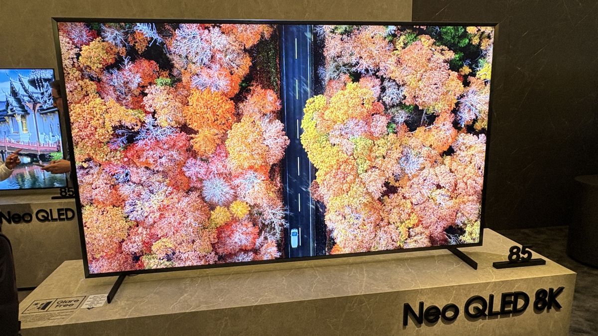 Samsung Q900F TV on a white stand at Samsung's CES 2025 showcase