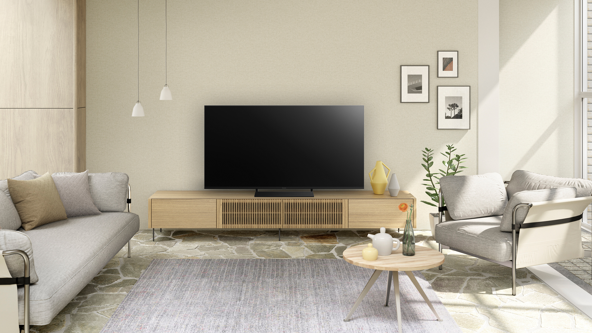 The Panasonic HX800 is the best TV on a budget, pictured here on a wooden media cabinet