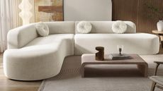 White curved Amazon boneless couch pictured in modern living room