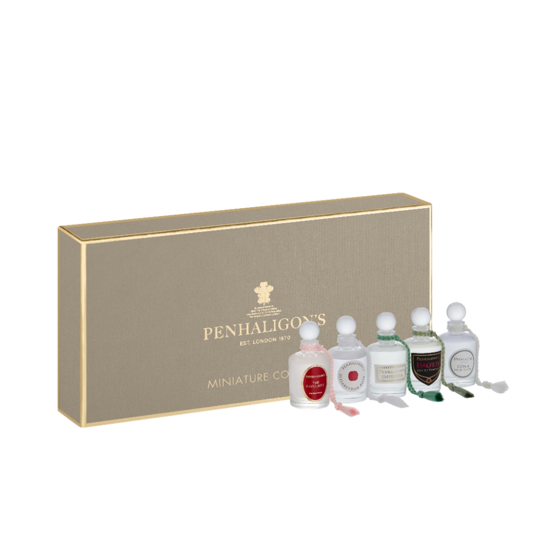 A product shot of the Penhaligon's Ladies Fragrance travel collection box, featuring mini bottles of The Favourite, Elisabethan Rose, Luna, Empress and Halfeti perfumes/ on a white background