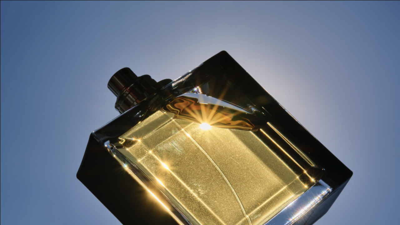 perfume bottle on a blue background