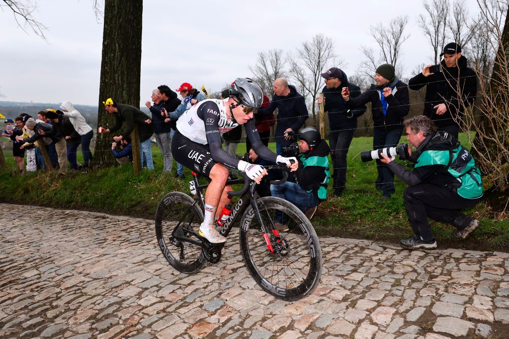 OUDENAARDE BELGIUM APRIL 02 Tadej Pogacar of Slovenia and UAE Team Emirates competes during the 107th Ronde van Vlaanderen Tour des Flandres 2023 Mens Elite a 2734km one day race from Brugge to Oudenaarde UCIWT on April 02 2023 in Brugge Belgium Photo by Luca Bettini PoolGetty Images