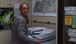 Cast Away Helen Hunt smiling at the copy machine
