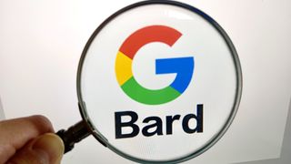 A magnifying glass being held up against the Google Bard logo