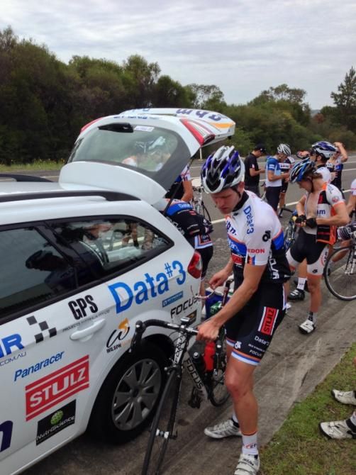 Riders refuel after being instructed to race to the top of a climb outside of Sydney of Day 2