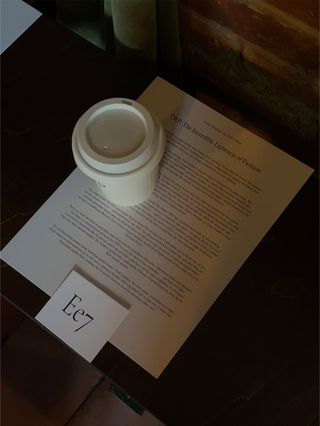 a coffee cup at the TWP show during NYFW