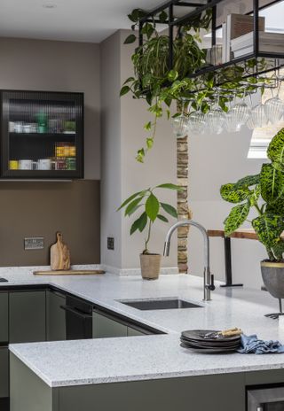 a kitchen idea with hanging glass storage