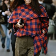 Woman in plaid jacket and pants