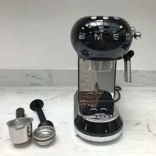 smeg espresso machine on countertop