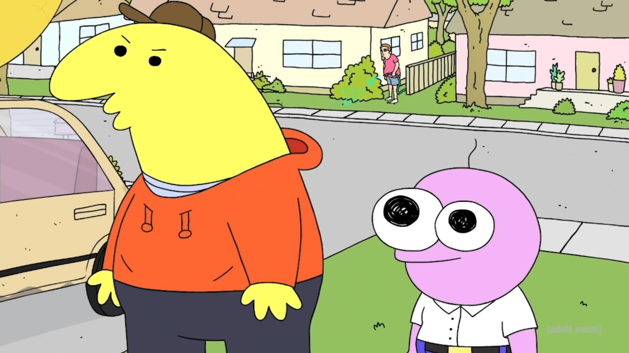 Charlie and Pim standing outside someone's house. 