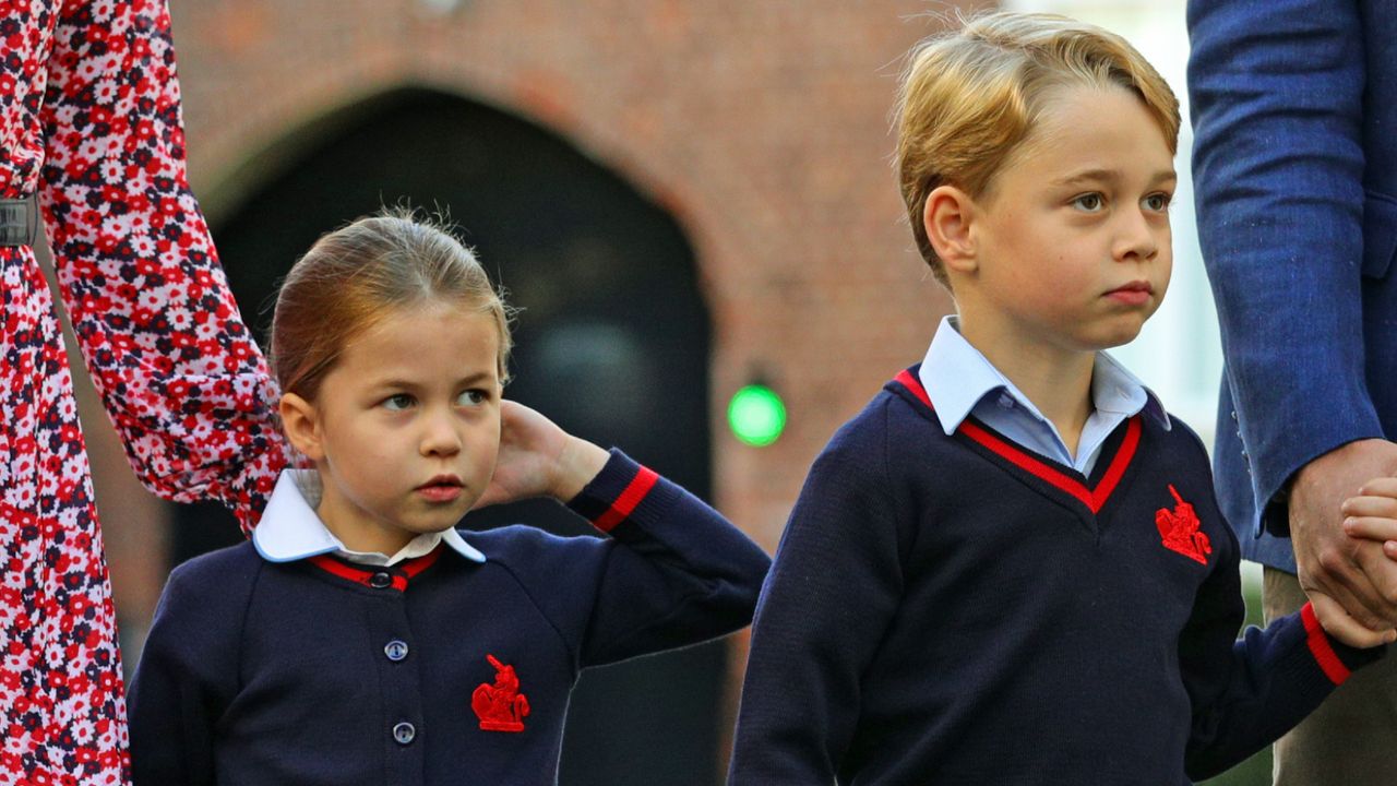 Britain&#039;s Princess Charlotte of Cambridge, with her brother, Britain&#039;s Prince George of Cambridge, arrives for her first day of school at Thomas&#039;s Battersea in London on September 5, 2019.