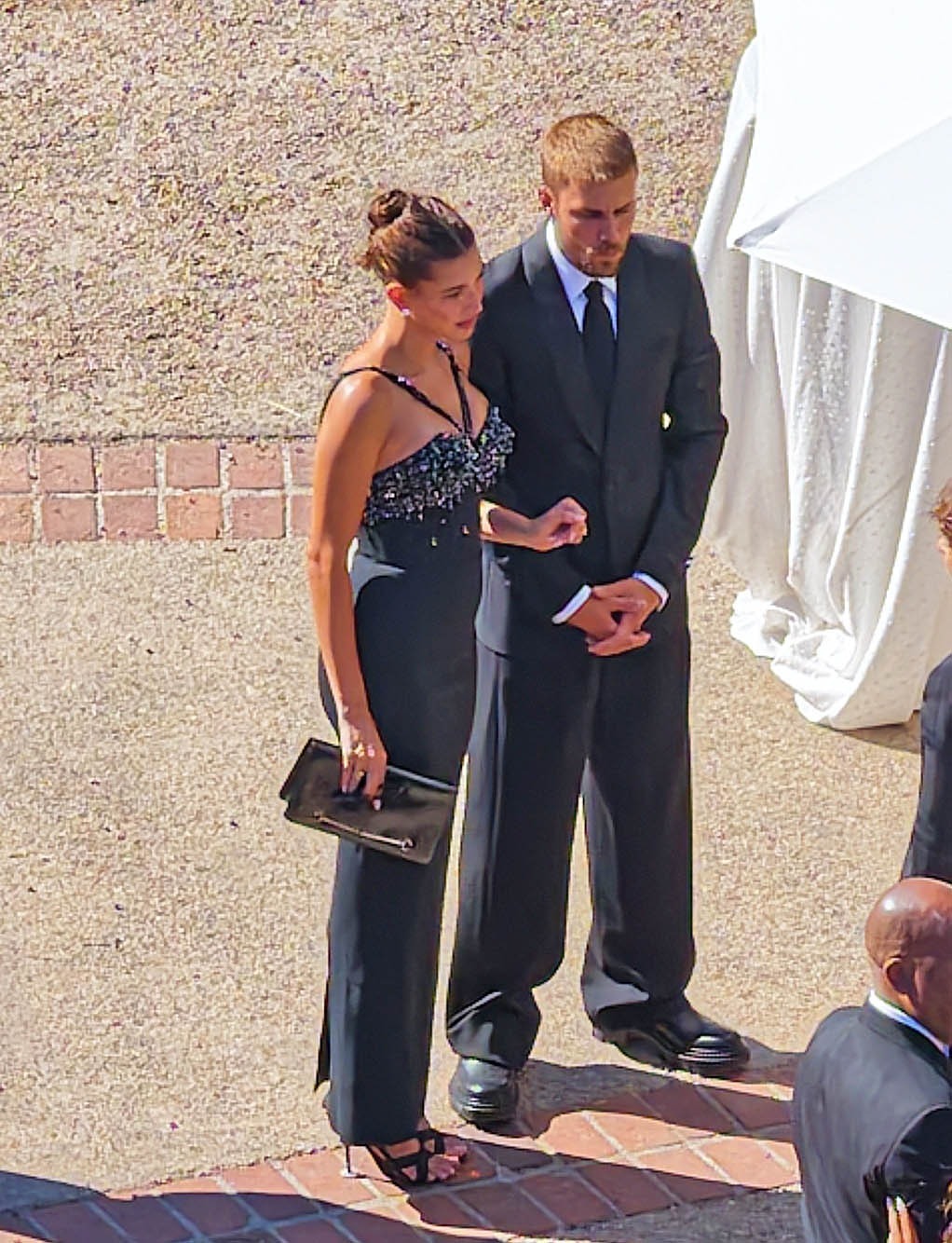 Hailey Bieber and Kylie Jenner styled different black-tie wedding guest dresses for Jordyn Woods's ceremony