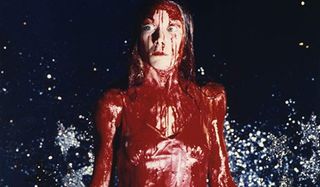 Carrie drenched in blood at the prom