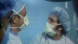 Albert Brooks with a surgeon in "Open Heart Surgery" on SNL