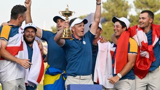 Luke Donald celebrates with Team Europe after the Ryder Cup win at Marco Simone