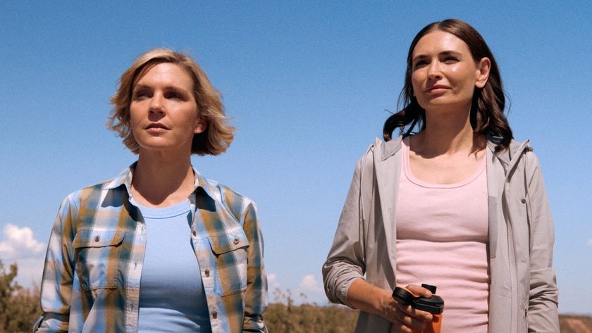 Carol and Zosia standing outside under a bright blue sky in Pluribus Episode 8