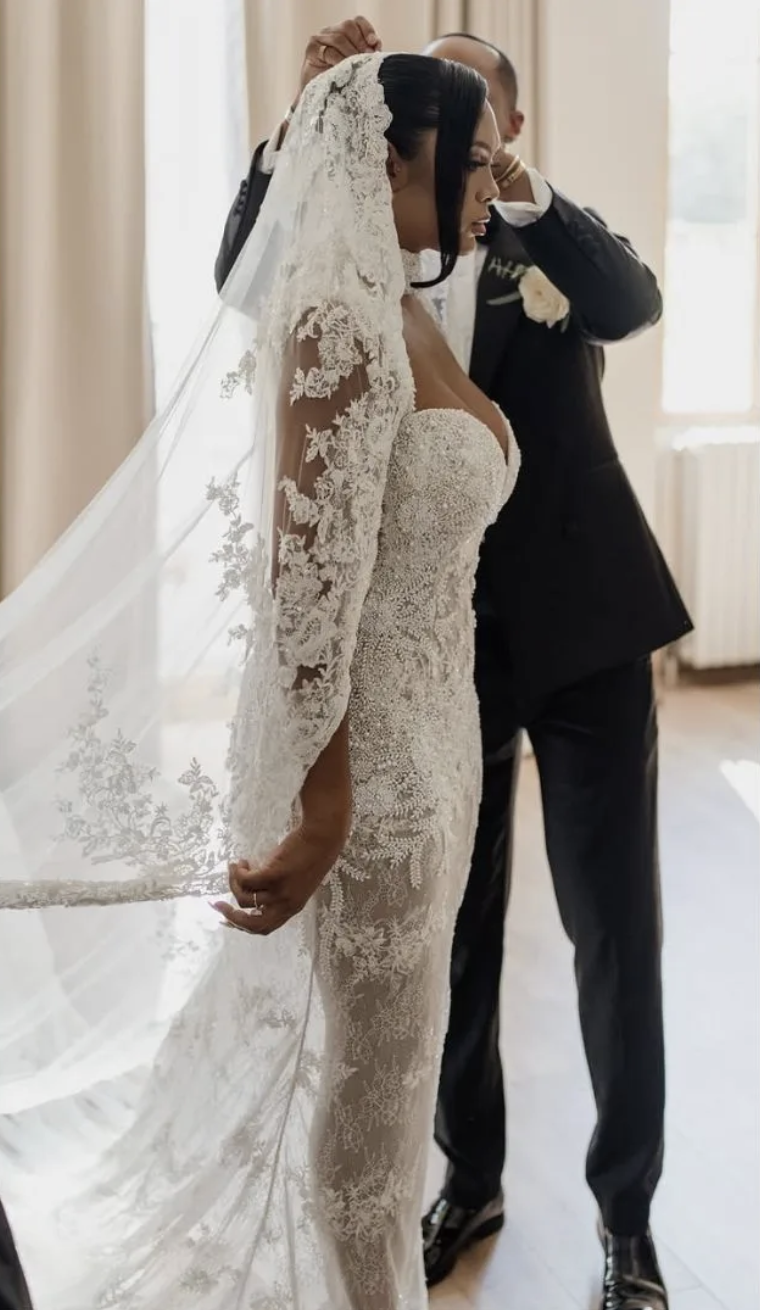 @rxkeya wears wedding dress and veil