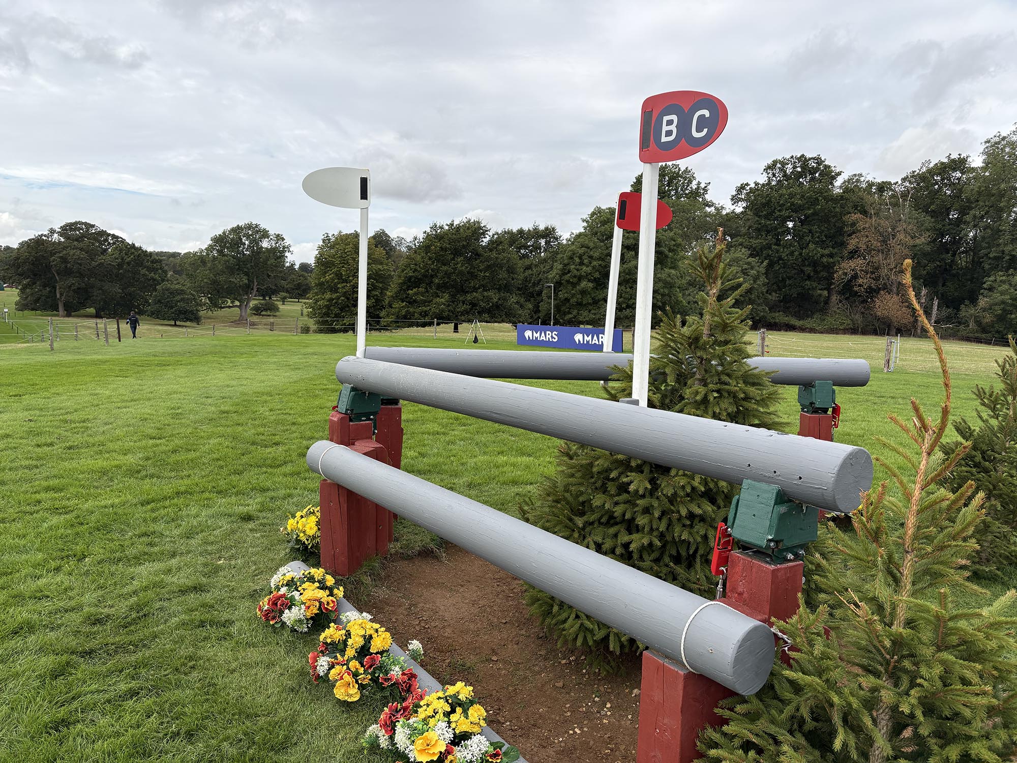 Wooden open corner fence over a ditch on the Burghley cross-country course 2026