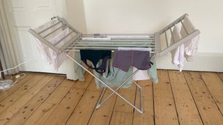 Dunelm Heated Airer With Wings with washing on