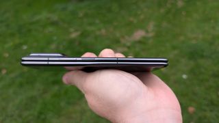 xiaomi mix fold 4 review images showing off the phone from multiple angles