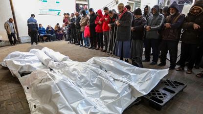 Body bags laid in the street in Rafah, Gaza