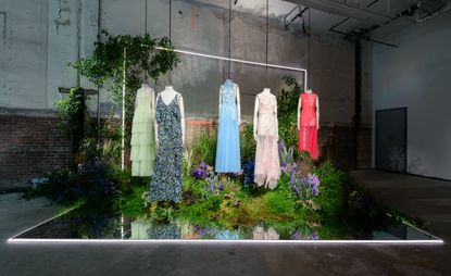 Mannequins dressed in dresses in green, floral, blue, light pink and red