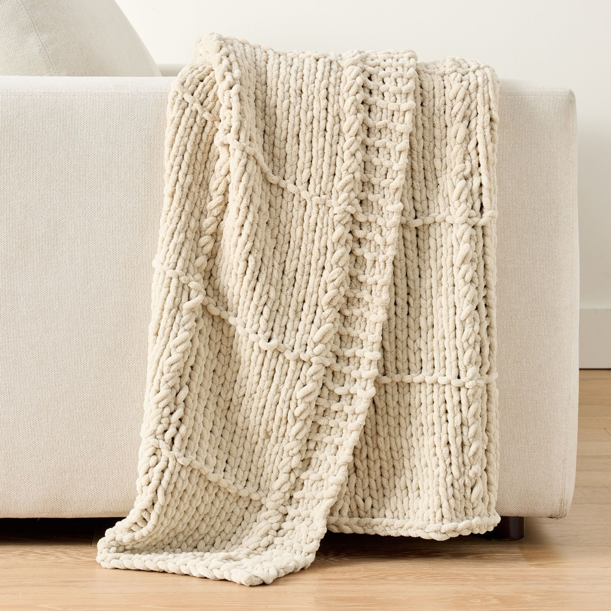 a white knit throw blanket