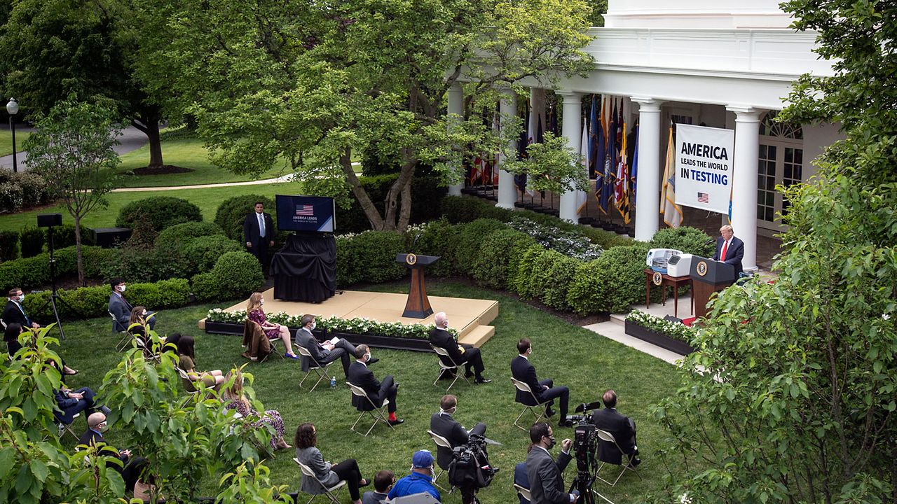 Donald Trump speaking to journalists at the White House