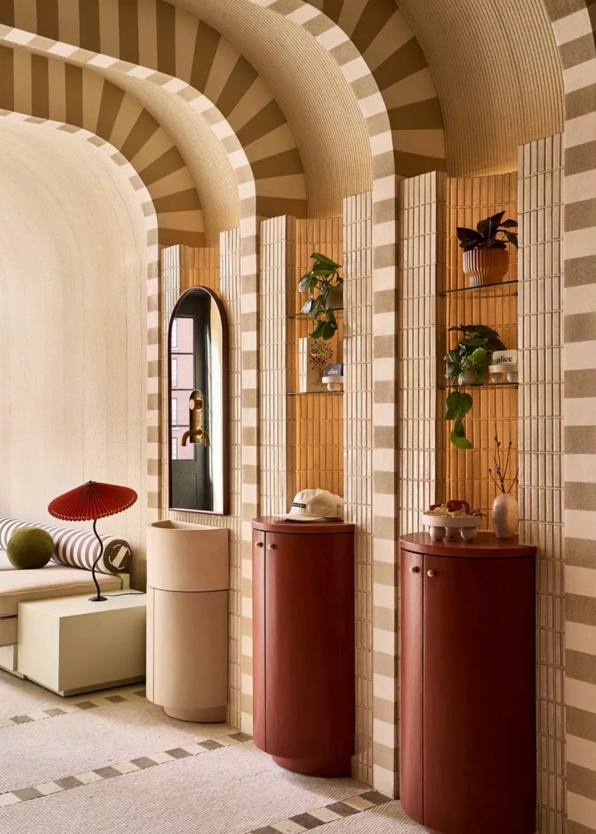 A beautifully tiled space in a capsule hotel