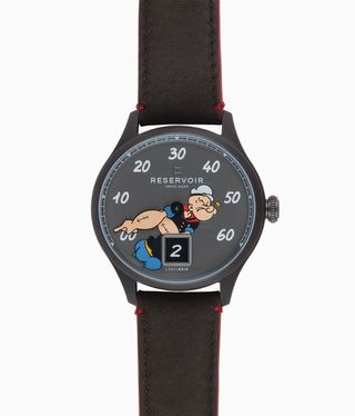 popeye watch with cartoon character on dial and arm as minute hand