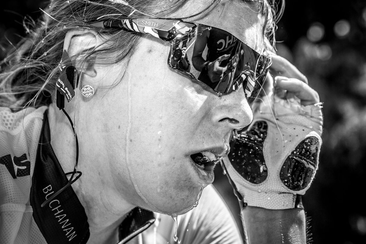 Rushlee Buchanan (UnitedHealthcare) cools off with water after the stage
