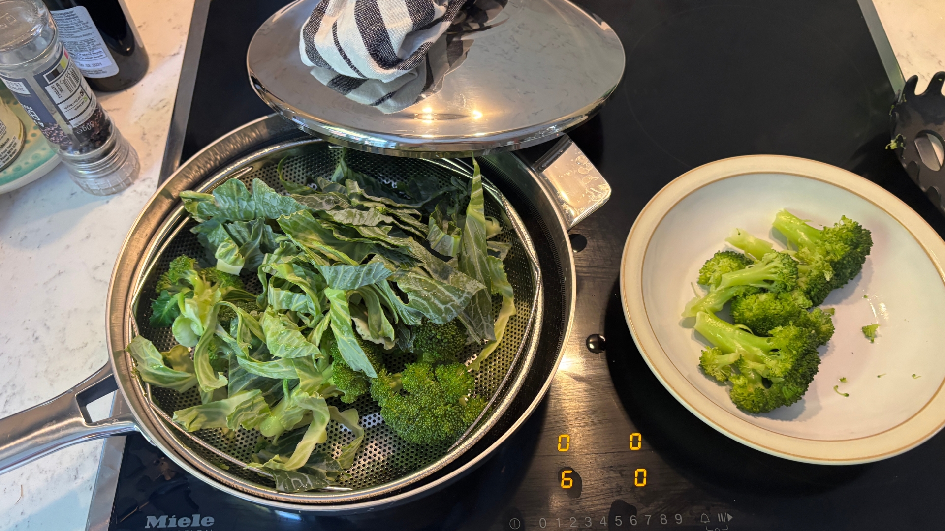 Testing the Lakeland 10-in-1 Only Pan Pro showing steamed vegetables