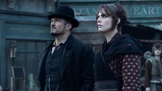 Orlando Bloom and Cara Delevingne as Rycroft Philostrate and Vignette Stonemoss in Carnival Row season 2