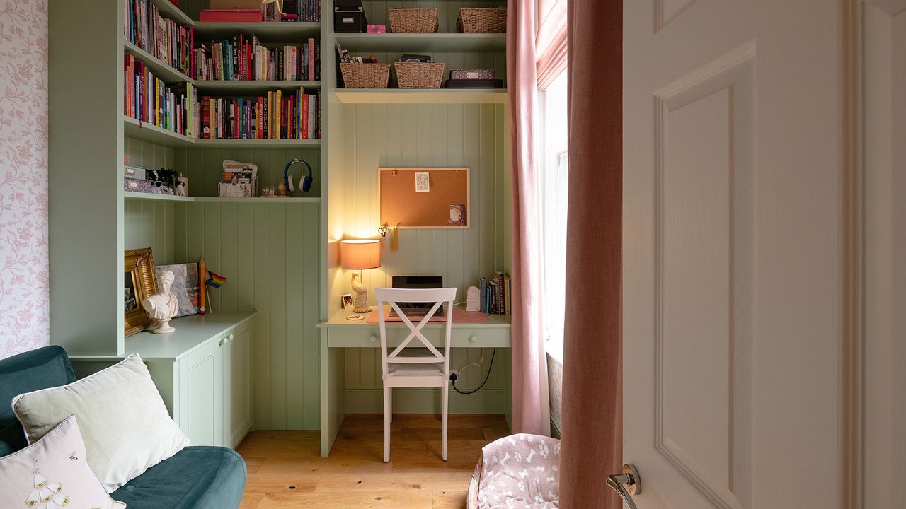Reveal of a small room makeover painted in sage green with floor-to-ceiling storage