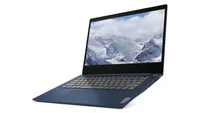 Lenovo IdeaPad lightweight laptop shown on white background being floated off the floor on an angle with screen open at 95 degrees with picture of snow covered mountains and clouds displayed
