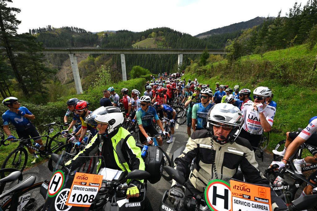 LEGUTIO SPAIN APRIL 04 A general view of the peloton waiting at Olaeta 582m after the neutralisation of the race due to a multiple crash during the 63rd Itzulia Basque Country 2024 Stage 4 a 1575km stage from Etxarri Aranatz to Legutio 550m Race neutralised due to a multiple riders crash and dropouts The breakaway will dispute the victory UCIWT on April 04 2024 in Etxarri Legutio Spain Photo by Tim de WaeleGetty Images