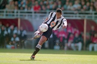 Newcastle United Les Ferdinand of Newcastle United shoots at goal during a FA Premier League match against Sunderland at St James' Park on April 5th, 1997 in Newcastle, United Kingdom. (Photo by Stu Forster/Allsport/Getty Images/Hulton Archive)
