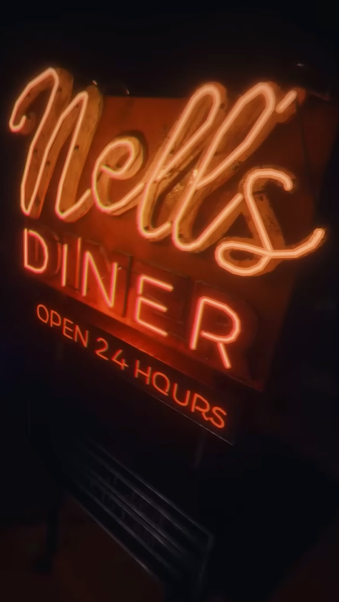 The Nell&#039;s Diner neon sign logo with &amp;quot;open 24 hours&amp;quot; at the bottom from the game Phasmophobia