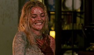 Ready or Not Grace smiles evilly with blood splattered all over her
