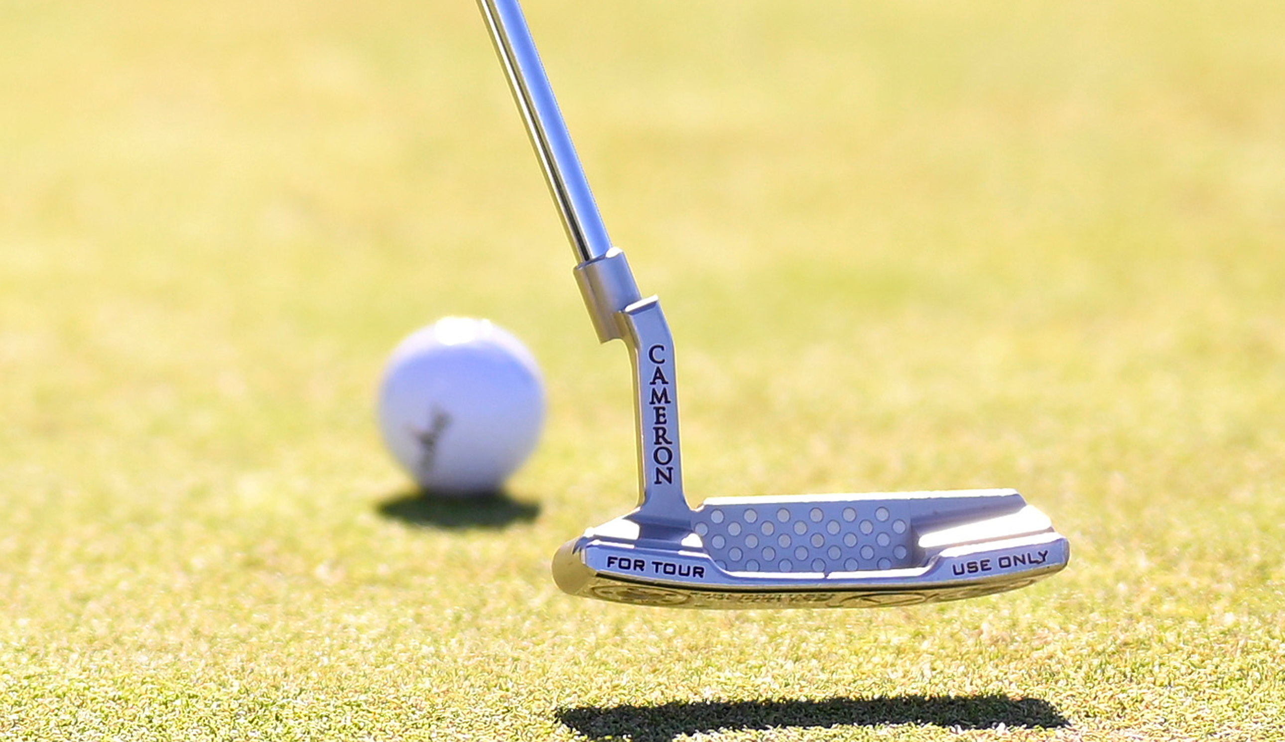 A close-up of Brooks Koepka's putter