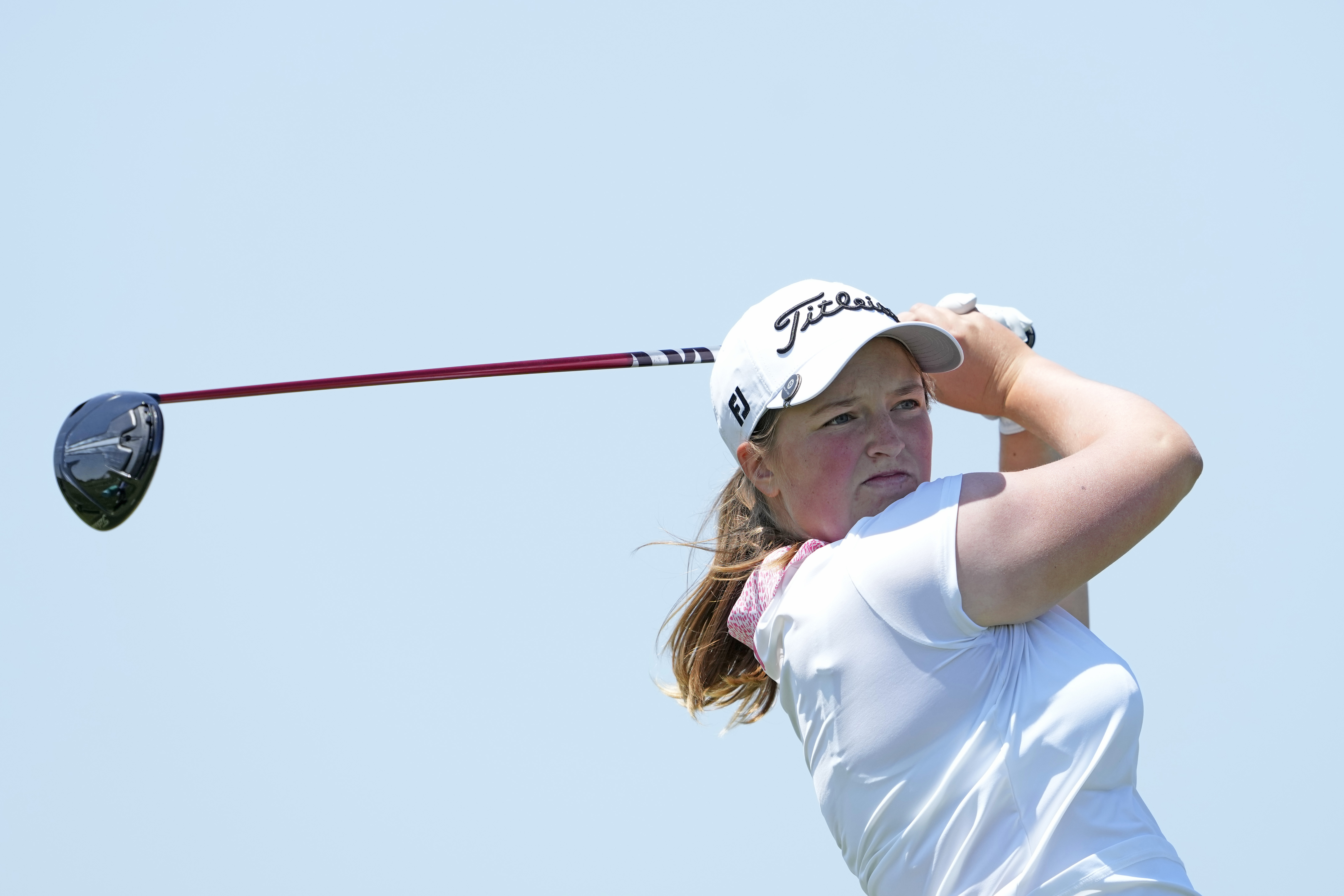 Lottie Woad hits a driver off the tee