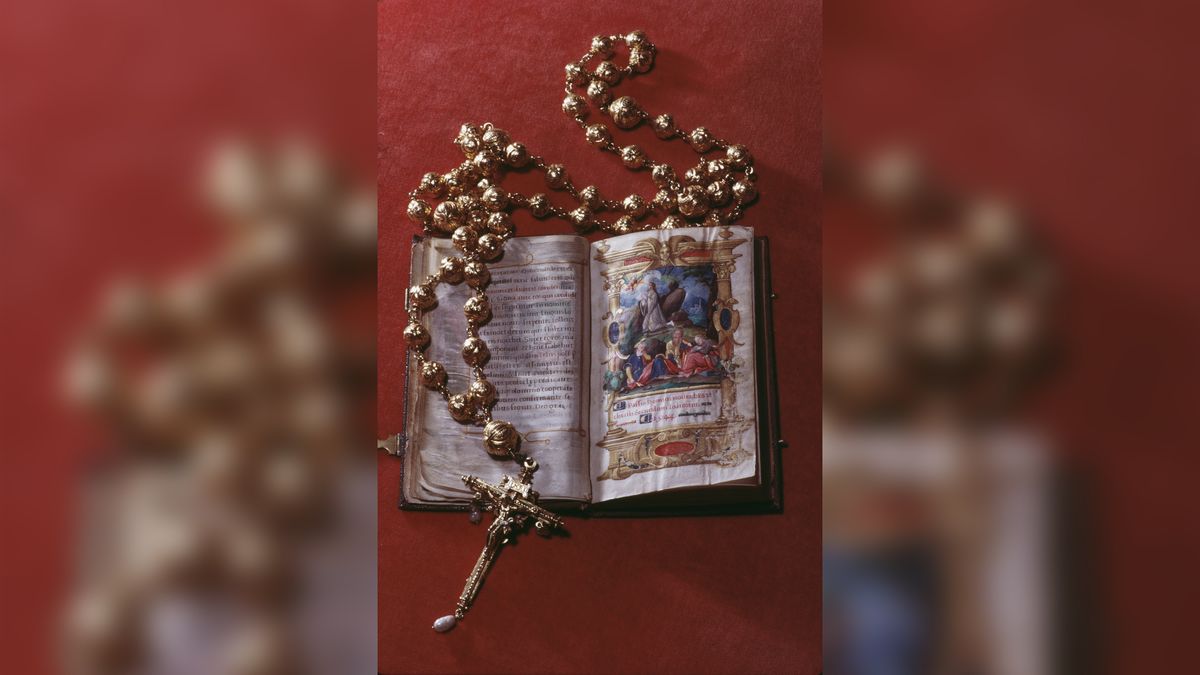 The rosary beads and bible belonging to Mary Queen of Scots (1542-1587) on display at Arundel Castle. 