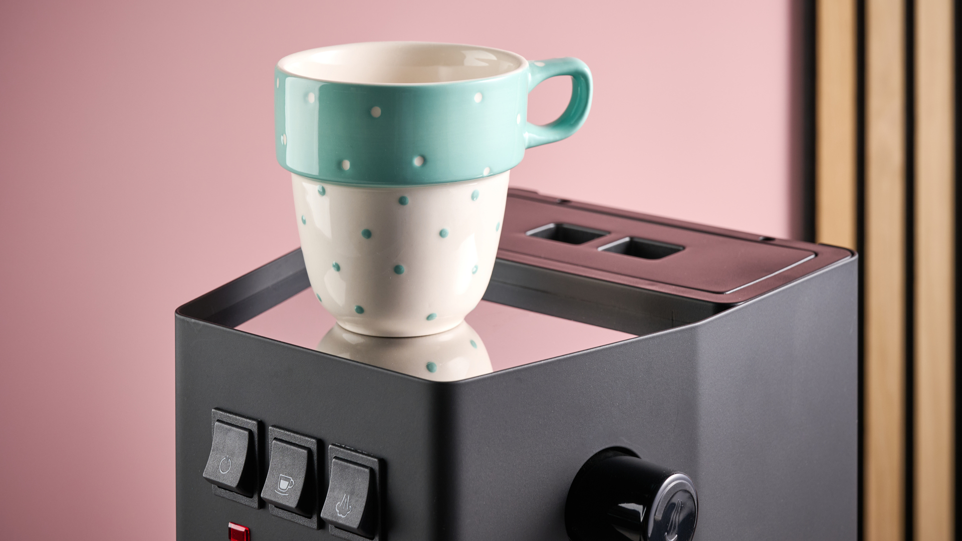 The top of the Gaggia Classic E24 Evo Pro with a spotty blue and white mug on it.
