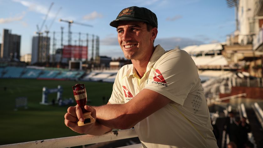 Pat Cummins of Australia poses with a replica Ashes Urn after Day Five of the LV= Insurance Ashes 5th Test match between England and Australia at The Kia Oval on July 31, 2023 in London, England. 
