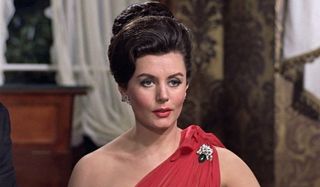 Eunice Gayson talking at the baccarat table in Dr. No.